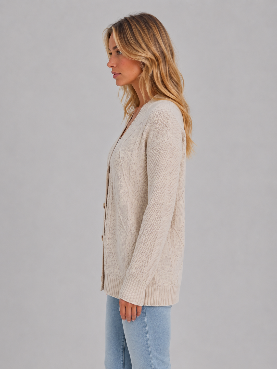 Dora | Gilet boutonné en maille torsadée à col en V